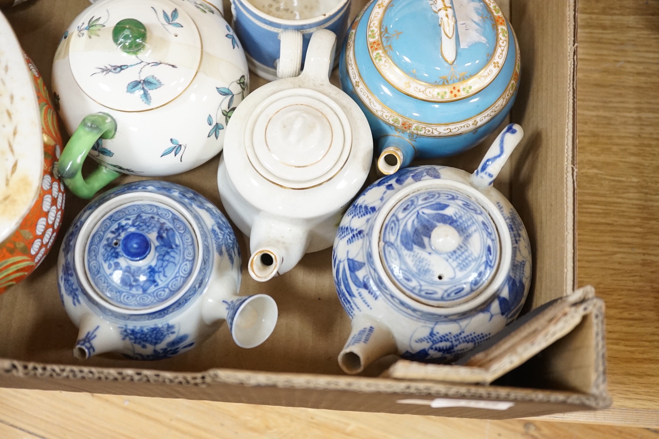 A large quantity of various teapots